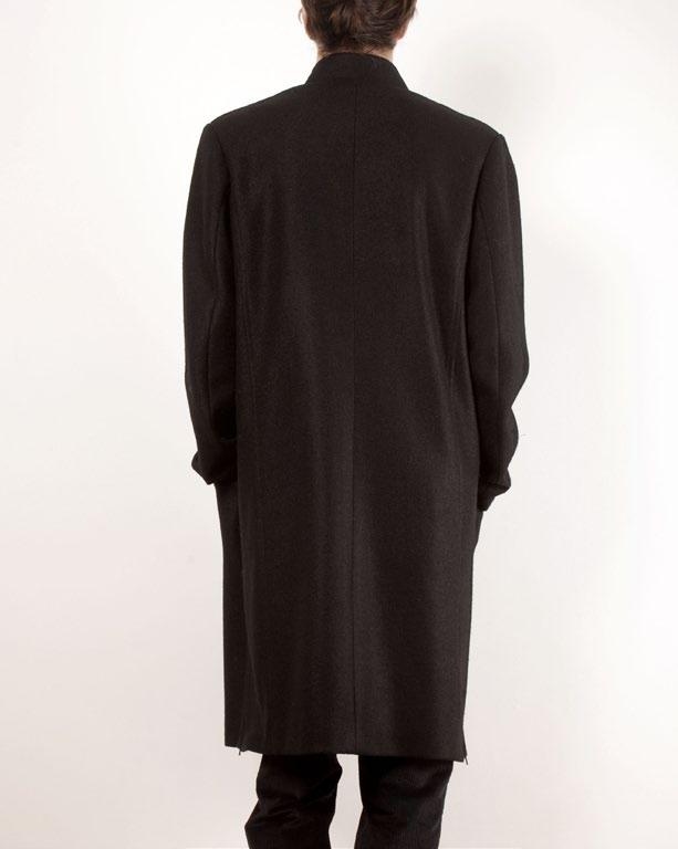 WOOL COAT with a banded collar and stiched front panels.
