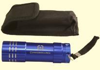 3" branded Flashlight w/ 3 X LED bulbs, aluminium body, back on/off button and needs 3 X AAA batteries (not