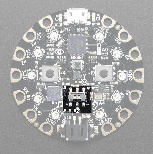 There is a single slide switch near the center of the Circuit Playground.