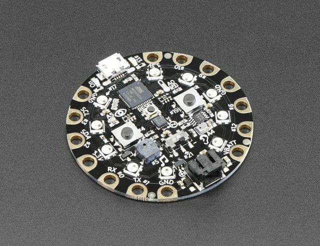 Circuit Playground has built-in USB support. Built in USB means you plug it in to program it, it just shows up - all you need is a Micro-B USB cable, no additional purchases are needed!