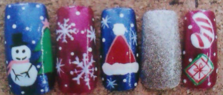 Snowman Designs To create this design, you will need nail polish in three colors.