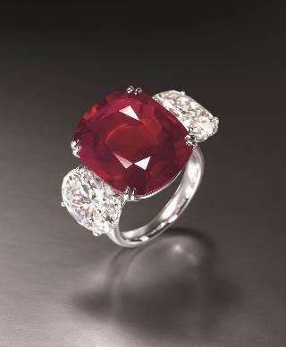 Mined from Mogok of Burma and flanked by white diamonds, this fiery beauty exudes the most preferred pigeon s blood colour the perfect embodiment of rarity and refinement.