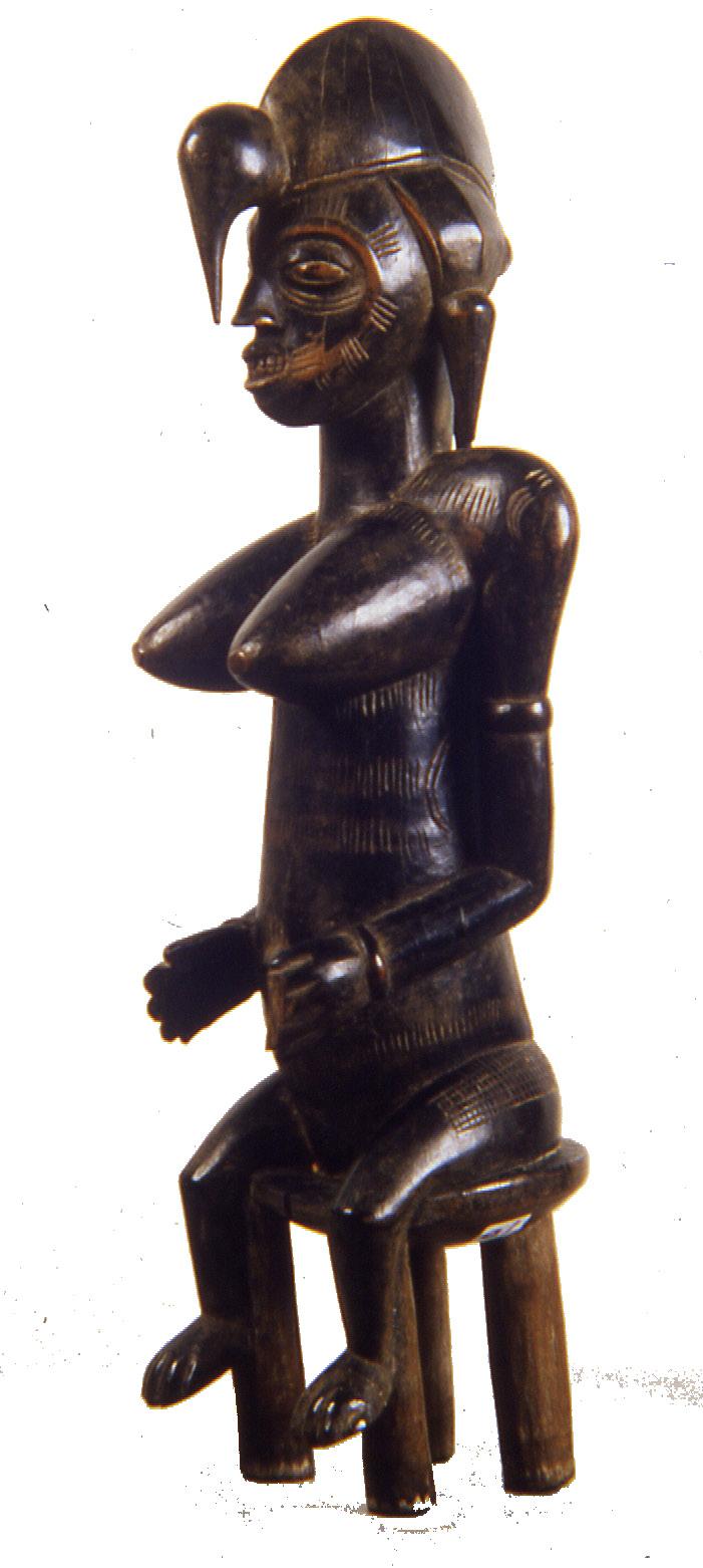 Seated Female Figure, Dogon Peoples, Mali. 26 x 7 x 7 1/4 inches Gift of Michael, Anne, Keil and Jessica Mello Mother and Child, Senufo Peoples, Ivory Coast.