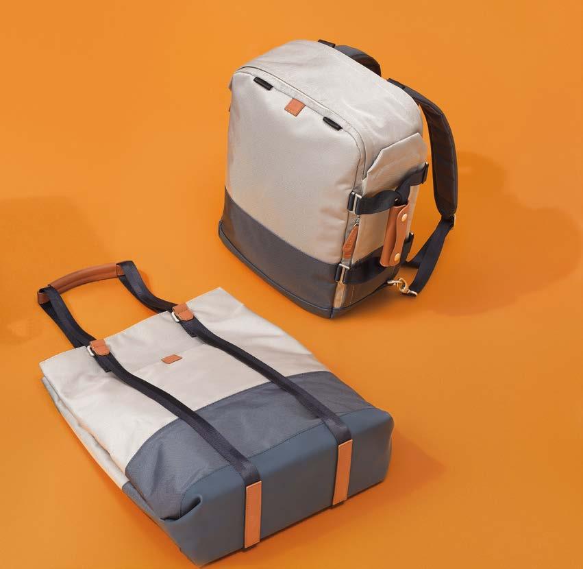 Travel Bag Modern travel bag, various inner and outer compartments, shoulder strap, outer zipper compartment, subtle embossed SEAT logo.