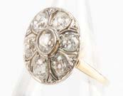 with mix of brilliant and baguette cut and centred by a transitional brilliant cut of approx 1ct, 14g 4000-6000 420.