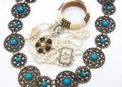 A collection of costume jewellery and fashion watches, in three punnets, with necklaces,
