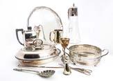 A collection of Victorian and later silver and silver plated items, including a pair of silver cauldron salts with blue glass liners, two silver pierced dishes, an