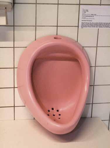 Photograph: Annely Köster Kaan Ozata [ PINK URINAL - AFTER DUCHAMP 28 X 45 X 25 CM INSTALLATION ] By placing an object which is intended just for men in this toilet, which is intended just for women,