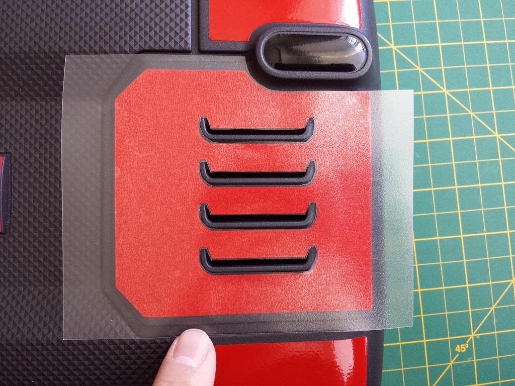 Remove badgeskin from backing, align the