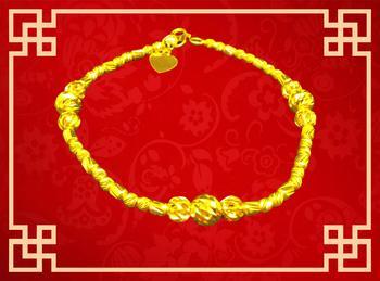 gold bracelet with simple charms, suitable for daily wear and