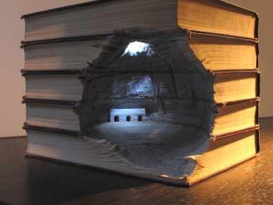 com/2011/12/carved-book-landscapes-by-guy-laramee/ Alex Queral does something similar, but with
