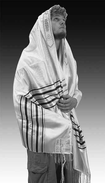 13. Two Special Traditions in Jewish Garments 303 Fig. 13.6: A man wrapped with tallit (mantle) and Tzitzit are attached to the four corners. Courtesy of The Galilee Experience. Fig. 13.7: Modern Tzitzit wikipedia, photographer Drosenbach.