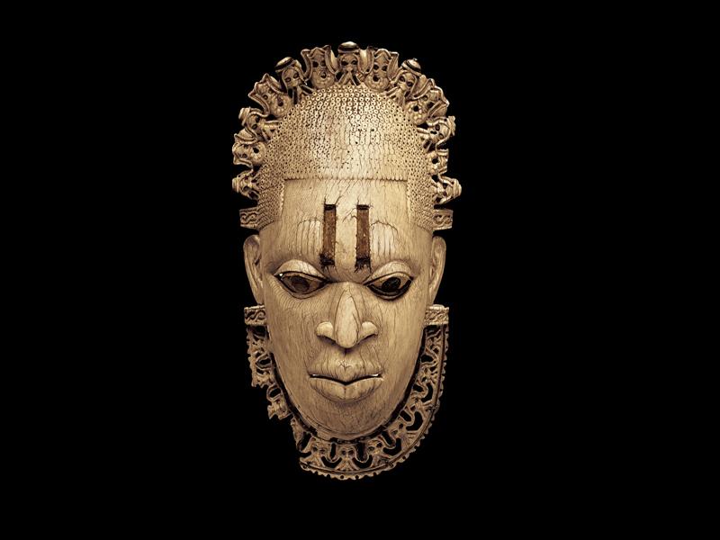 Closer Look: Hip Pendant Representing an Iyoba ("Queen Mother") Pendant Mask. Court of Benin, Nigeria. Early 16th century. Ivory, iron, copper. Height 9-3 8".