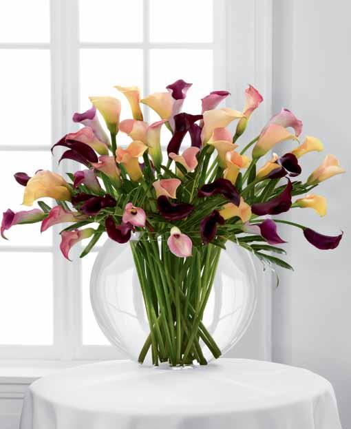 the ftd luxury collection modern treasures To achieve a powerful reaction, our impeccable pillow vase is filled with an extraordinary arrangement of fluted calla lilies.