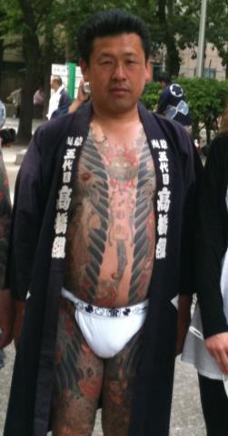 This group is a faction of the second largest crime syndicate in Japan, Sumiyoshi-kai. 158 The office of Takahashi-gumi is situated along the route of the mikoshi procession.