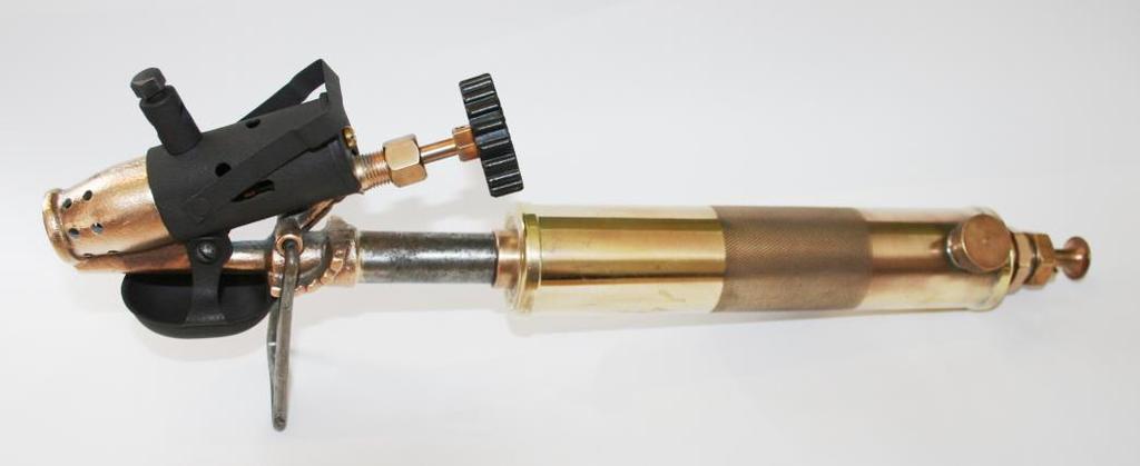 Released in May 1948 was a one pint lamp (Figure 13) in which the company used the bronze burner assembly from the SHSI, which shown in Figure 14.