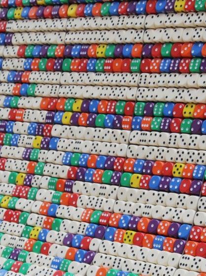 Virtual Failure is a suspended tapestry-like construction made of thousands of coloured dice. The work was constructed by manually assembling the dice according to algorithmic rules.