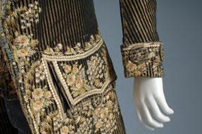 Shown alongside a reproduction of an 18th-century man s embroidered coat, these objects are reminders of the pocket s fashionable use throughout history.