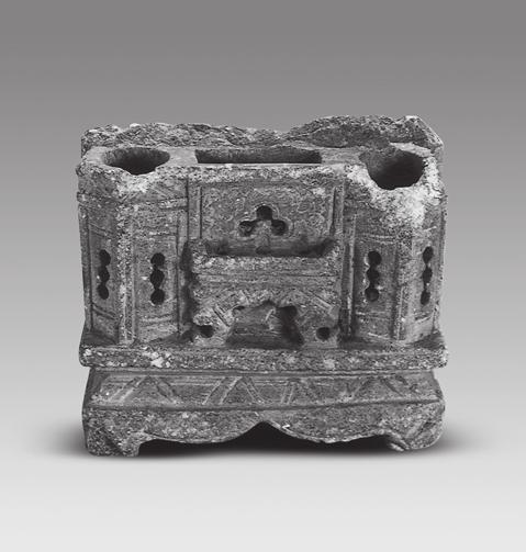 Fig. 25 Glaze-less pottery whistle (XF-Cai:40) Fig. 26 Stone chiwen ridge ornament (WF6:4) Fig.