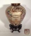 1205-B CHINA Porcelain planter with polychromes decor. Marked underneath. H: 35,5cm - 14'' 1206 CHINA White porcelain vase with polychromed decor. H: 37cm - 14.