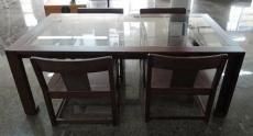 1061 TABLE WITH SIX ARMCHAIRS Wood and glass table with six chairs among which there are four who are identical and two others that are