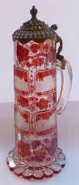 Lot 127 Lot 120 120 A 19th Century gilt metal mounted ruby flash cut Bohemian tapering cylindrical Tankard finely engraved with six vignettes depicting German palaces etc.