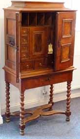 VAT) 545 An unusual 18th Century French Canadian (possibly Quebec) pine Side Cabinet, the moulded top above two doors, each with central panel depicting a decorative motif of a raised lozenge flanked