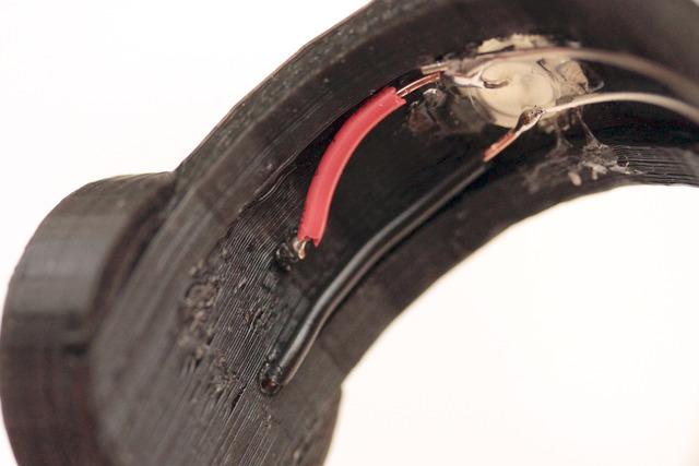 To protect the wires, you can cover them with electrical tape.