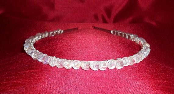 Welcome to my Bridal Collection! Crystal Twist Band Simple but beautiful crystal band. Made with AB crystal twists that really catch the light and sparkle on a silver plated band.