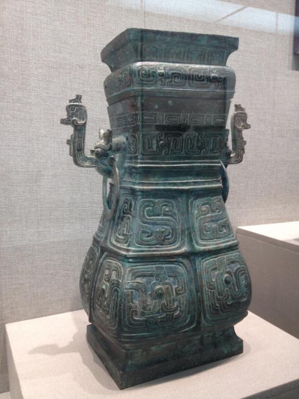 18. Inventory number: M26:140 Object title: Hu (decorated vessel) with inscription on the body: 仲姜做恒公尊壶 ( this hu was made by Zhong Jiang for a noble ). Dimensions: Height 53cm; Width 17.