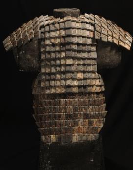 50. Inventory number: 007092 Object title: Armour Dimensions: Height 99cm; Width 75cm; Thickness 78cm Material: Polished and drilled rectangular limestone pieces with copper wire Date made: Qin