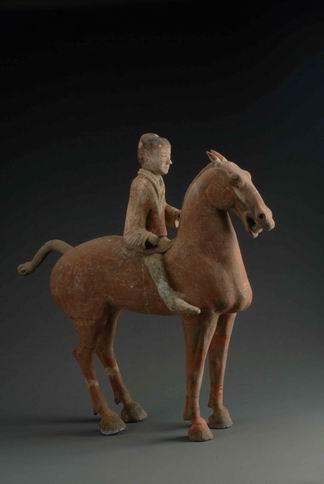 92. Inventory number: Yqd009 Object title: Painted cavalryman figure on a horse Dimensions: Height 68cm; Length 63cm Material: Pottery Date made: Han Period (206 BCE 220