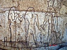 33 from his tomb at Tanis [27]. Fig.30 Shoshenq I wearing a Nemes Headdress [24].