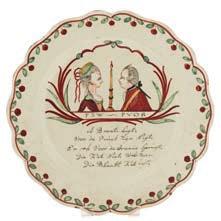 Durhams, 1862, Art Union of London 8/77, Copyright Reserved, Copeland, 45 cm high * 150-250 579 A Dutch-decorated Leeds creamware plate of silver shape, painted in green, red, yellow and