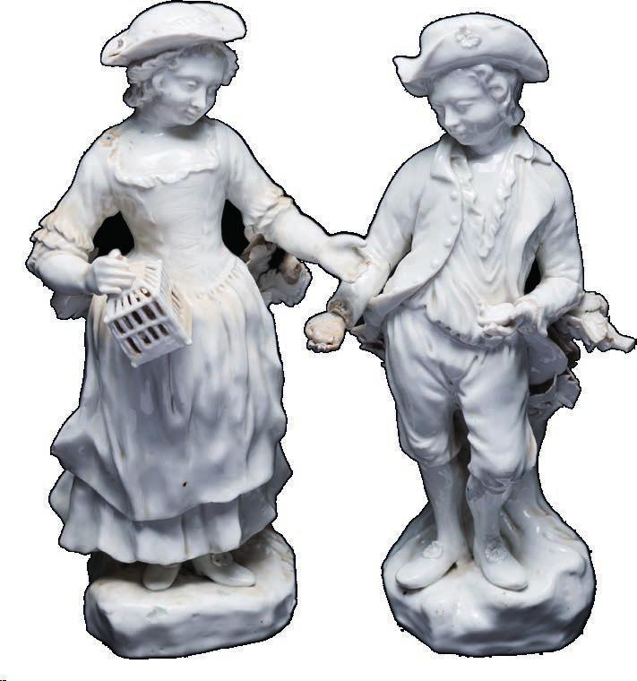 610 A pair of Bristol [Champion s] white glazed figures of Liberty and Matrimony the girl holding a