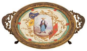 * 200-250 633 A French Japonesque ormolu-mounted pottery tripod dish painted with a central panel depicting a man