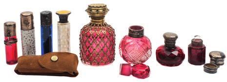 * 150-250 506 Three glass scent bottles and one other comprising a miniature example, the clear body with white banding applied with a heart and A.B.