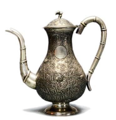 $800 - $1,200 59 A Tall Chinese Silver Teapot A Tall Chinese Silver Teapot, 19th century, the teapot with a bamboo leaf and bird meander and an S