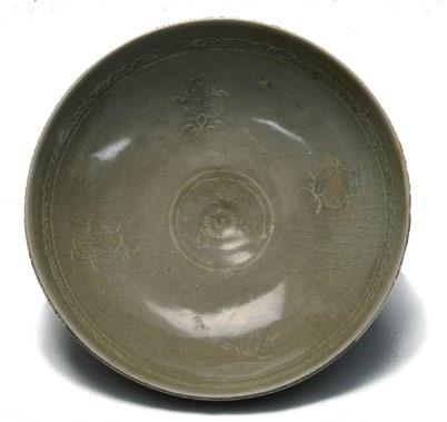 110 A Korean Celadon Bowl, Koryo Dynasty A Korean Celadon Bowl, Koryo Dynasty, the bowl of shallow form, sanggam inlay to depict a central chrysanthemum within a double ring band, flanked by four