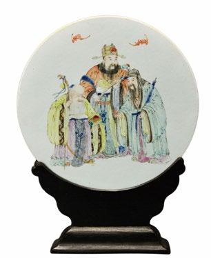 142 A 19th Century Chinese Porcelain Plaque A 19th Century Chinese Porcelain Plaque, the circular plaque with three officials holding a peach, a ruyi sceptre and a scroll, with bats overhead, with a