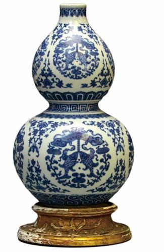 Provenance: From a New Jersey collector $400 - $600 153 A Chinese Blue & White Double- Gourd Vase A Chinese Blue and White Double-Gourd Vase, the porcelain vase decorated with cobalt underglaze blue