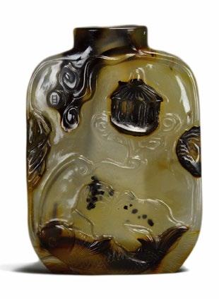 8 An 18th Century Chinese White Peking Glass Snuff Bottle An 18th Century Chinese White Peking Glass Snuff Bottle, painted with overglaze enamels, one side with a cat resting on a rock beneath