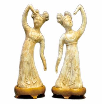 38 A Pair of Chinese Unglazed Earthenware Figures A Pair of Chinese Unglazed Earthenware Figures, mingqi, Sui or