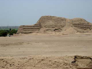 The temple is built alongside the Huaca del Sol on the Bank of the Rio Moche by the Moche