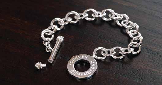 durable stainless steel for carefree wear. Both men and women will enjoy the elegant beveled-edge styling and the comfortable 20-inch stainless steel chain.