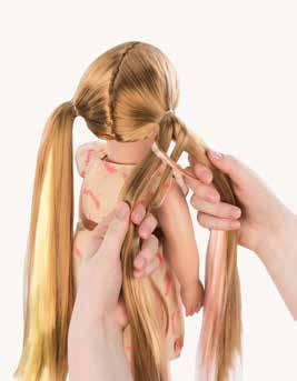 Then tie hair in pigtails with an elastic.