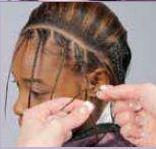Maintain an even tension on all strands. 11. Move across the back, and take the next diagonal parting.