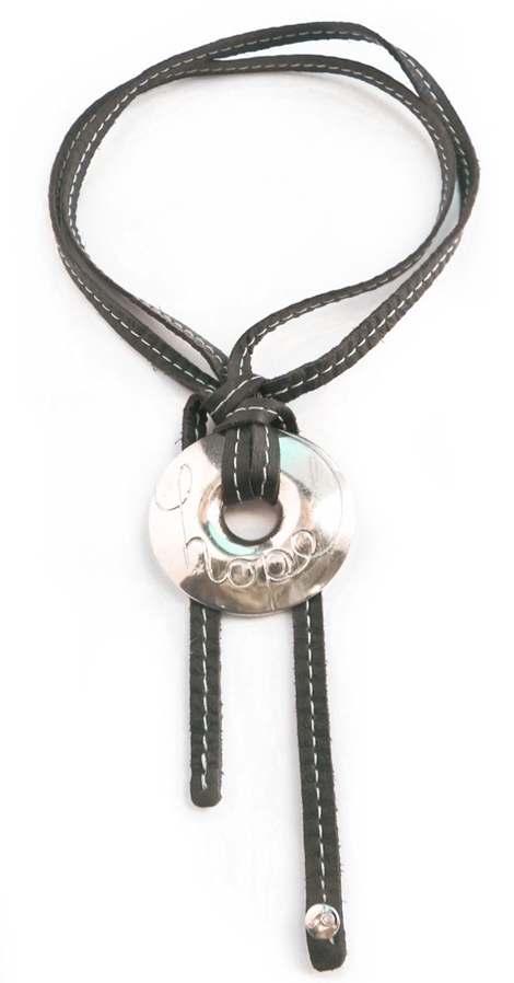 Mia Mia leather One leather strap wrapped tight around the neck, make one knot above the pendant and one knot under the pendant. Can also be worn long around the neck.