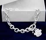 Sterling silver plated with a 3/4 x 3/4 heart charm that says Pets Leave Paw Prints On Our Hearts.