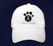 The front is a black paw print with a purple ribbon with the words Opt to Adopt.